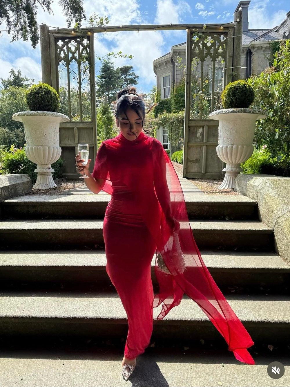 Elegant Red Evening Gown with Sheer Cape